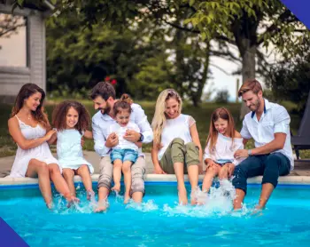 Families enjoying a swimming pool together