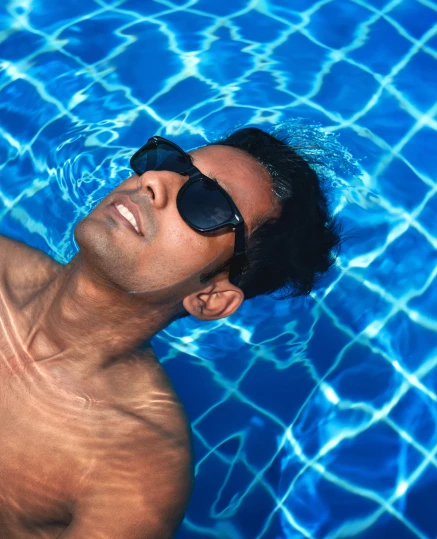 Man relaxing in a clean pool